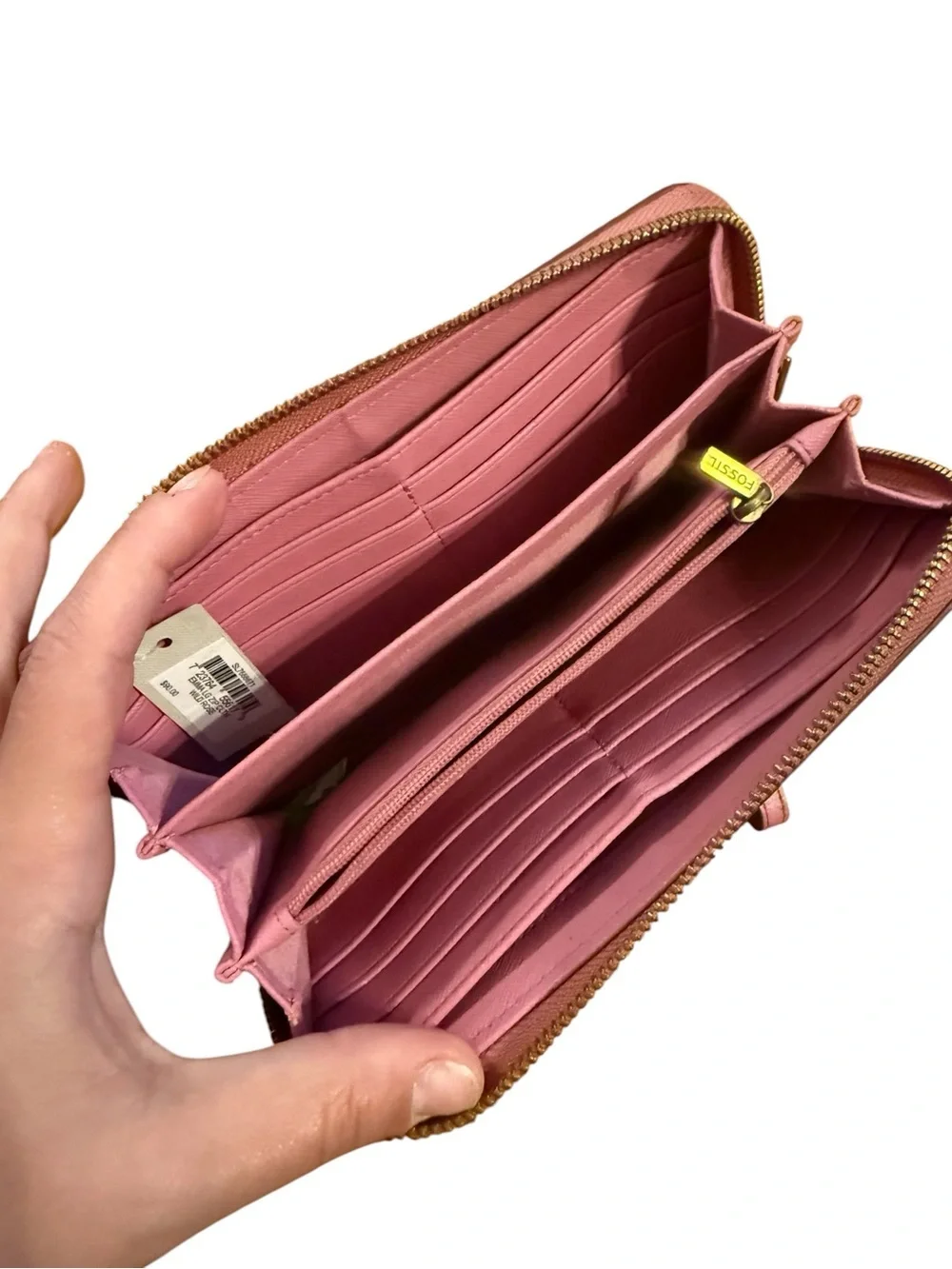 Fossil Perforated Pink Wristlet Clutch with Charm Accents